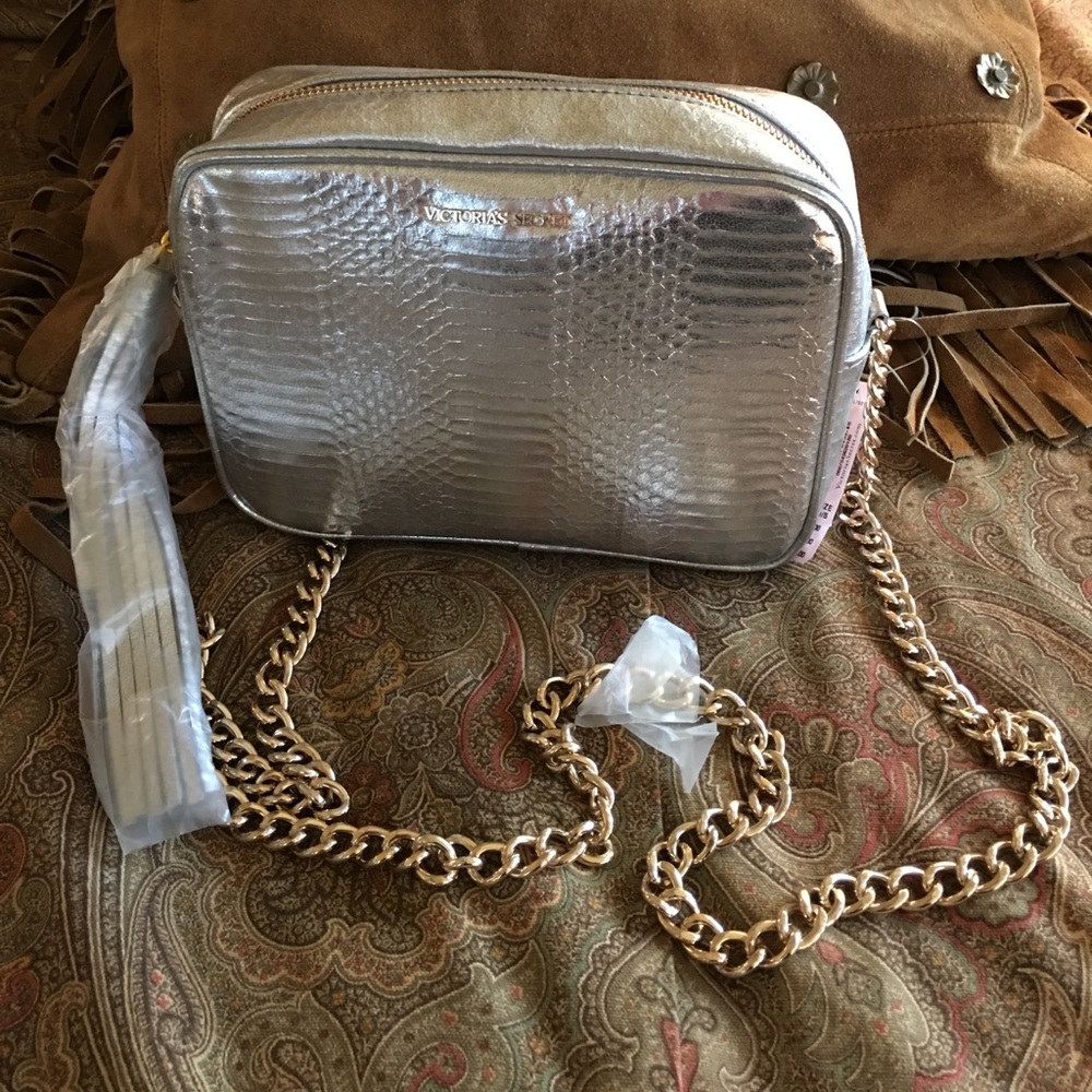 Victoria’s Secret silver and gold purse.